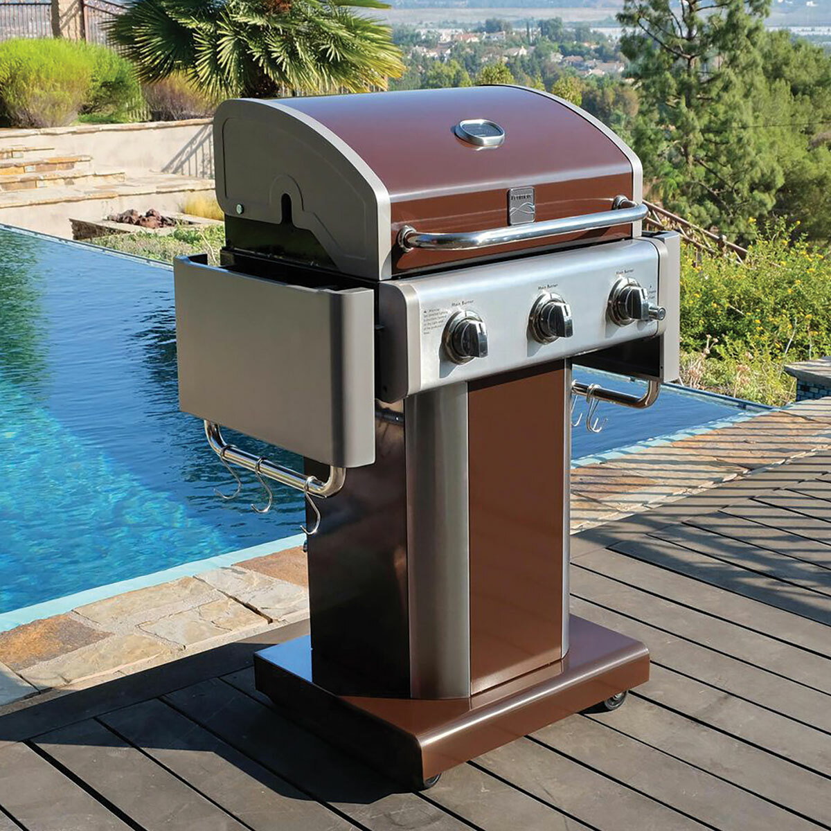 Kenmore pedestal Grill next to pool with shelves folded down