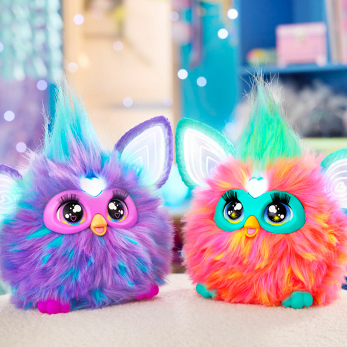 Purple and Orange Furby sitting in a bedroom