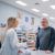 A patient speaks with a pharmacist.